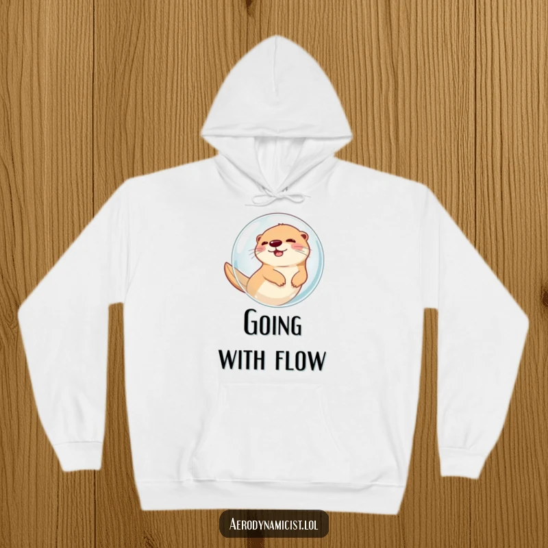 Funny Hoodie: A laughing otter encased in a clear bubble, zooming through the sky, embodying chaotic fun and adorable adventure for cozy wear.